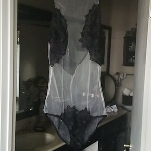 See thru bodysuit.